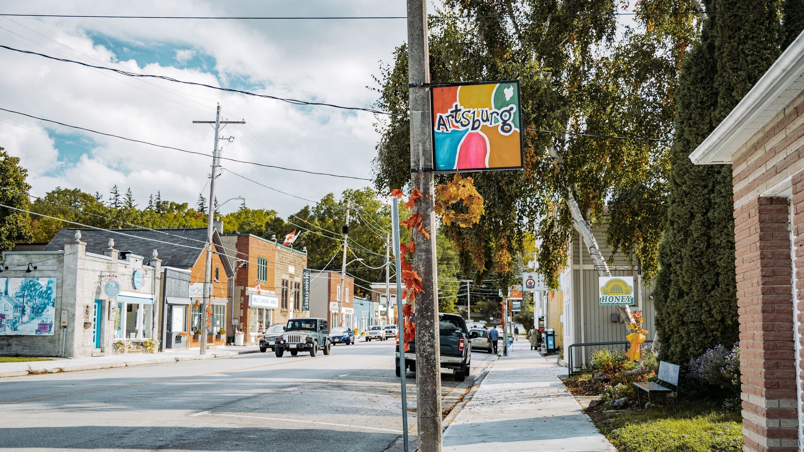 A photo of the streets of Clarksburg in the summer.