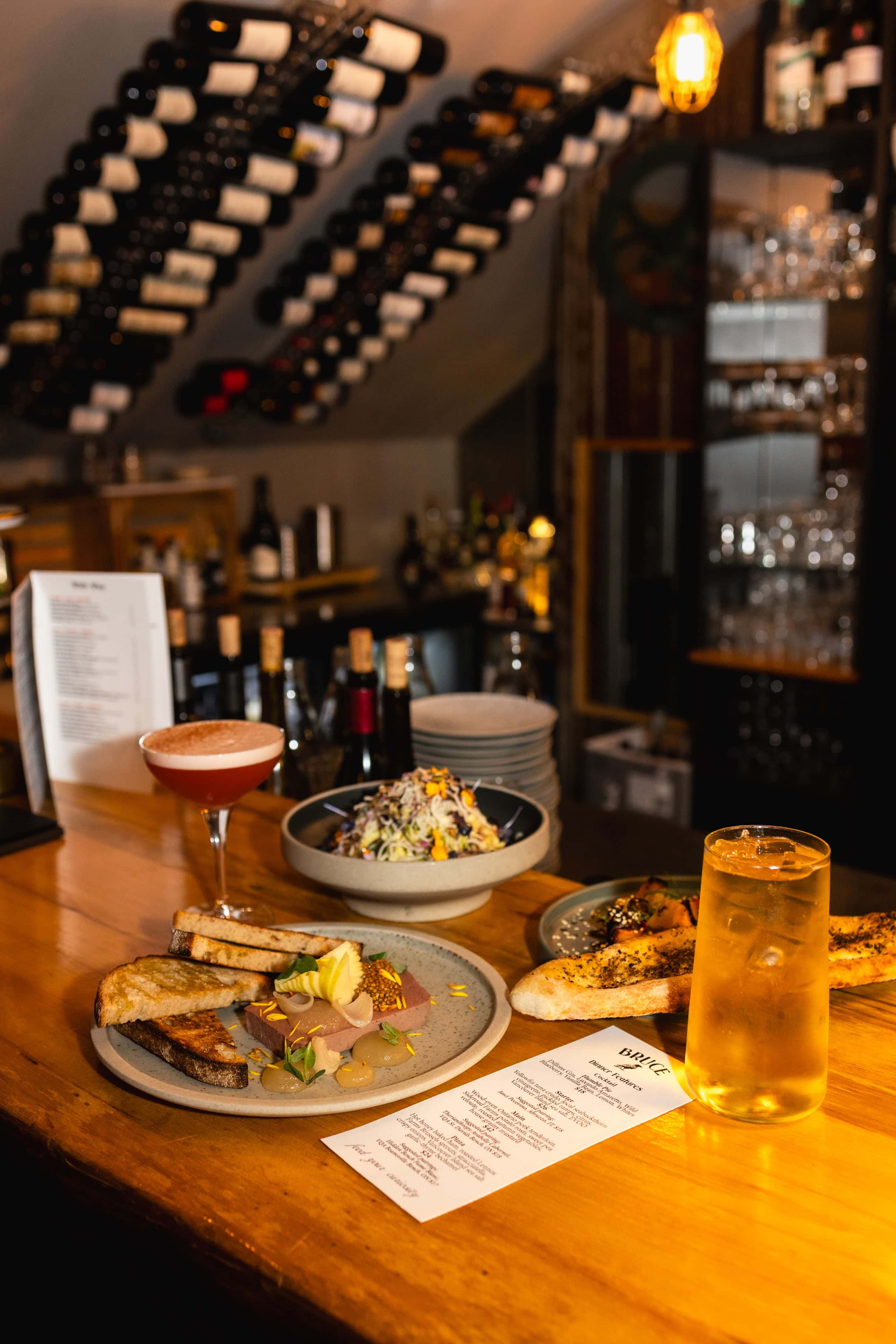 A table full of delicious food and drink at Bruce Wine Bar in Thornbury