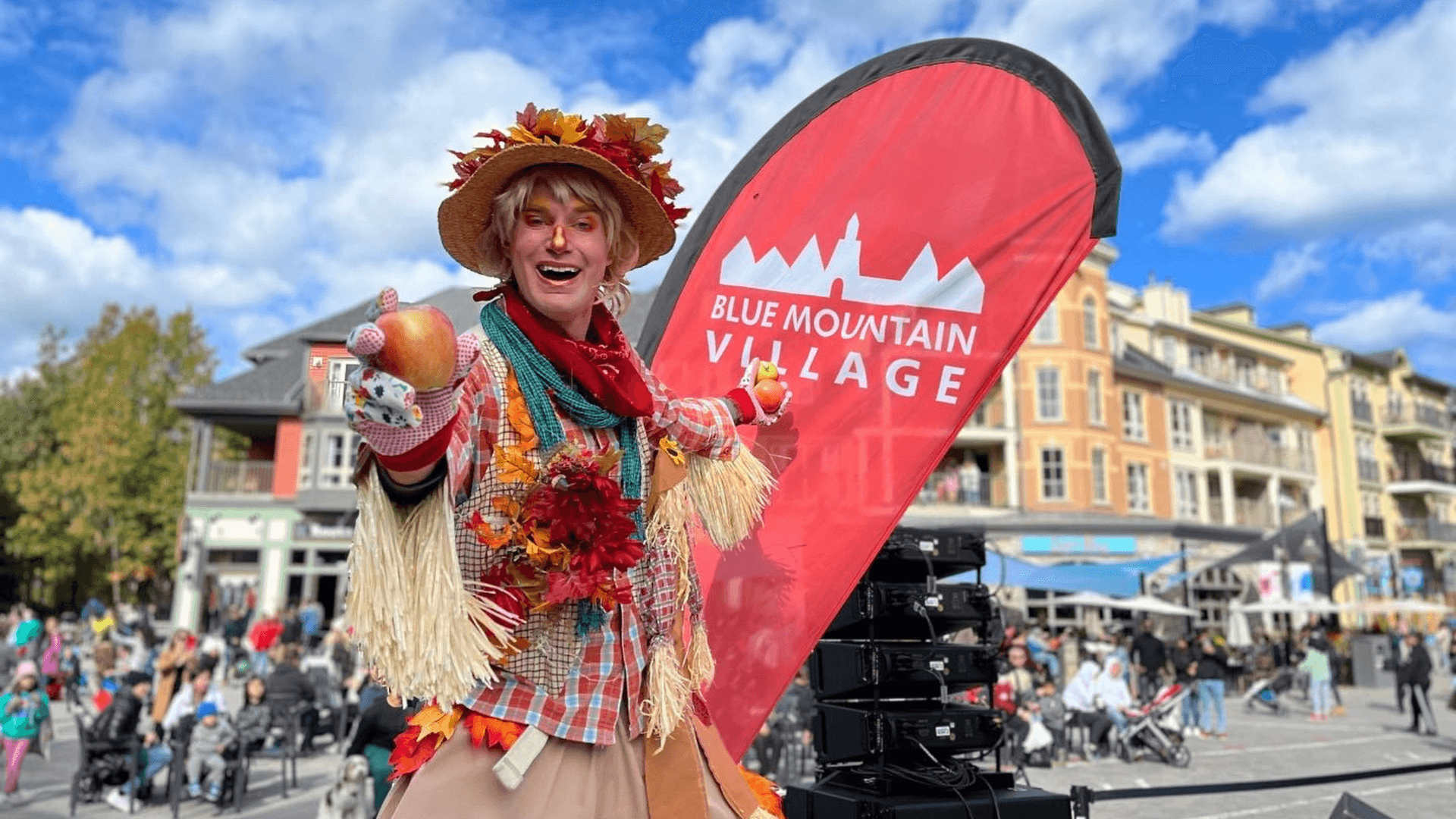 An impressive stilt walker juggling apples at Blue Mountain Village during the annual Apple Harvest Festival Weekend in October.