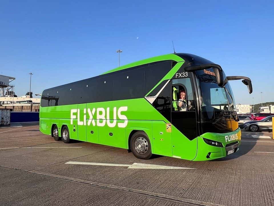 An image of a green FlixBus charter.